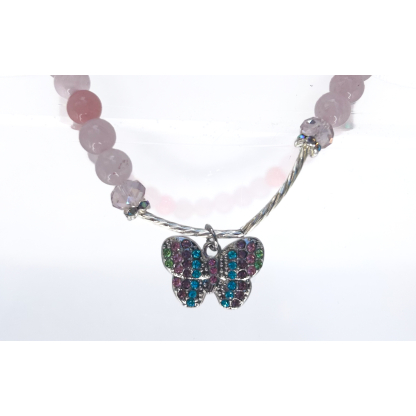 Close-up of Rose Quartz Butterfly Necklace on a white background, showcasing the sparkling butterfly charm and polished pink crystal beads.